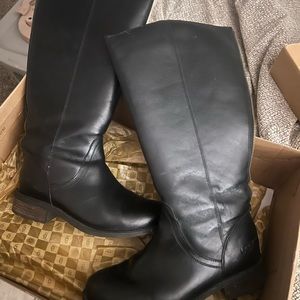 Tall black leather UGG boots